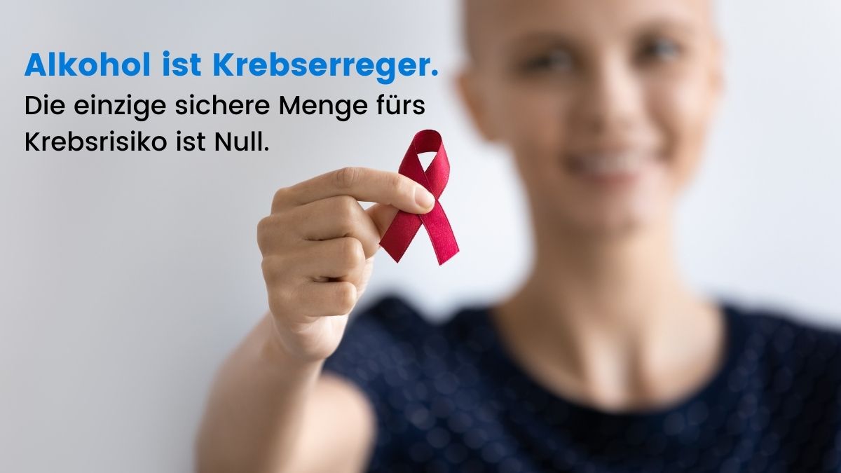 Frau hält Erinnerungsschleife in der Hand